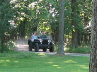 Paula and Evan coming up the hill