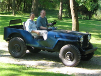 Paula and Evan on a "highspeed" test drive after fixing the engine timing